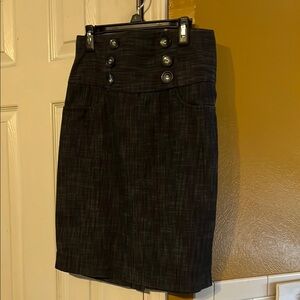Elegant Black Button-Detail Skirt. Waist 13 1/2”. Size 7.